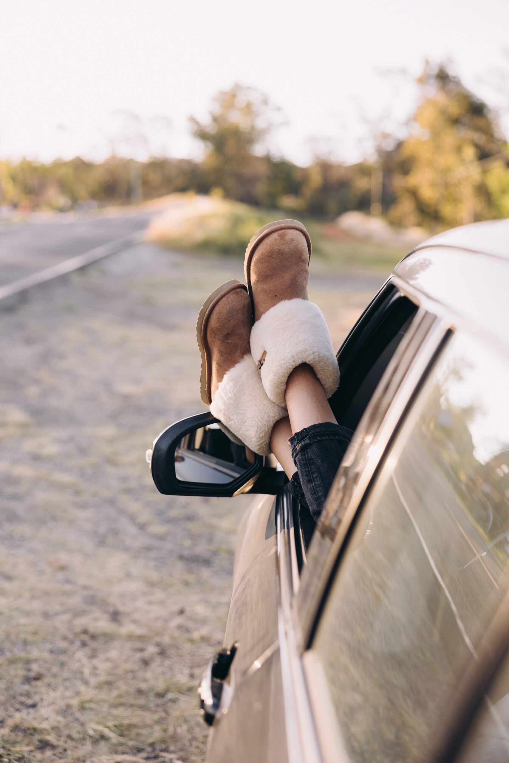 slippers hanging out car window